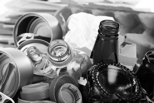 Garden clearance team starting eco-friendly clearance in a residential garden